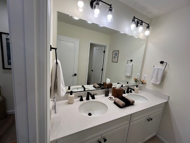 Building Photo - Stunning 5-Bedroom Custom Home with Solar, EV Charging & Private Media Room