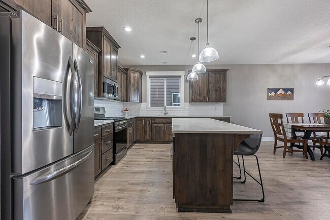 Building Photo - Modern 4BD/3BA Rental with Garage & Fenced...