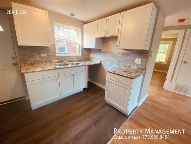 Building Photo - 8153 S Colfax Ave