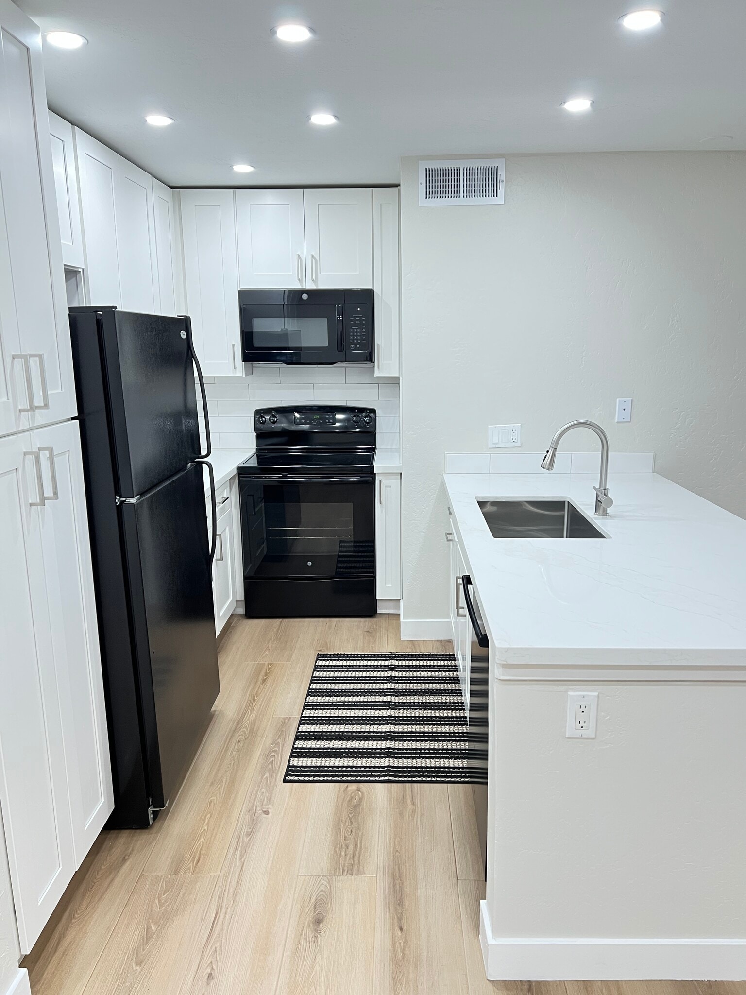 New kitchen quartz countertops, faucet, deep stainless sink, new microwave, Bosch dishwasher - 2935 N 68th St