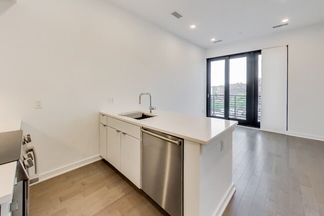 Building Photo - Top floor residence in elevator building with sweeping views.