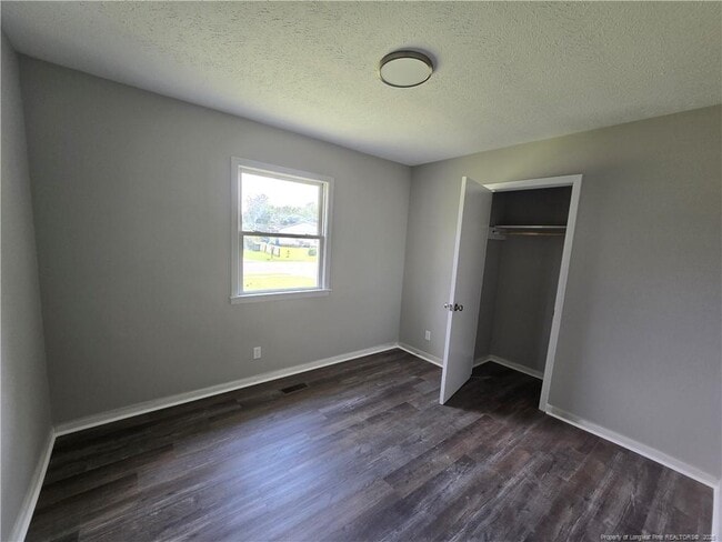 Building Photo - 303 Cartwright Dr