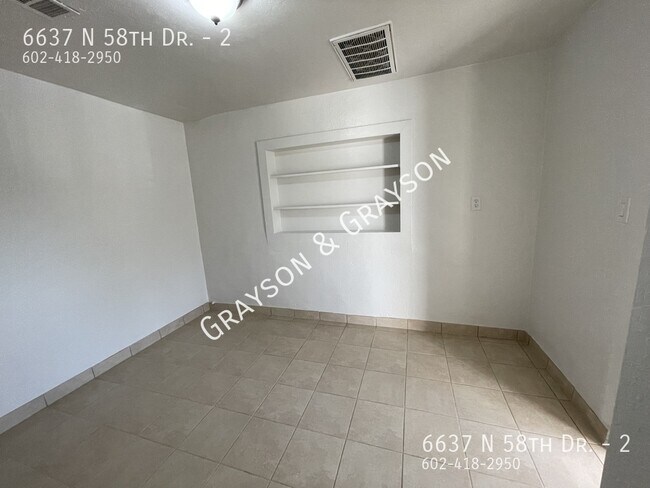 Building Photo - 6637 N 58th Dr