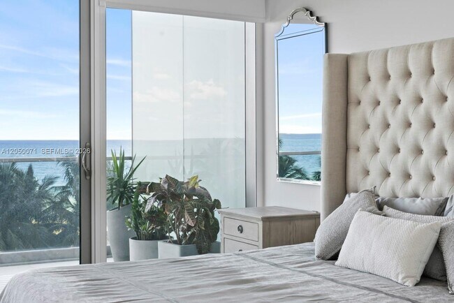 Building Photo - 10203 Collins Ave