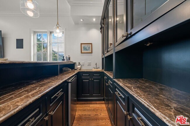 Building Photo - 9023 Alto Cedro Dr