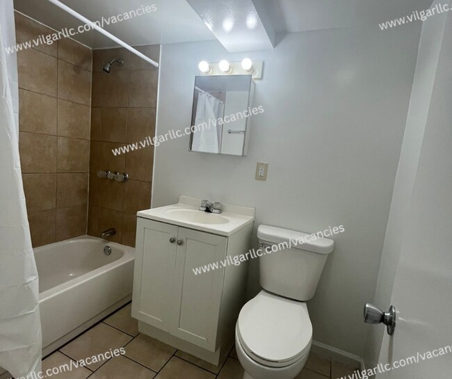 Building Photo - 1677 W 14th Ave