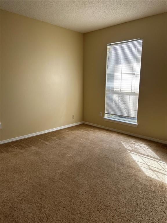 Building Photo - 8202 Woodstone Dr