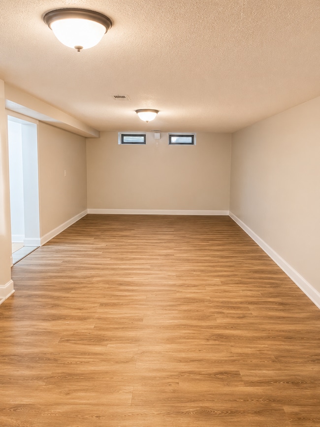 Building Photo - Charming 3BR Rental with Extra Living Space in Basement