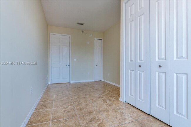 Building Photo - 1690 SW 27th Ave