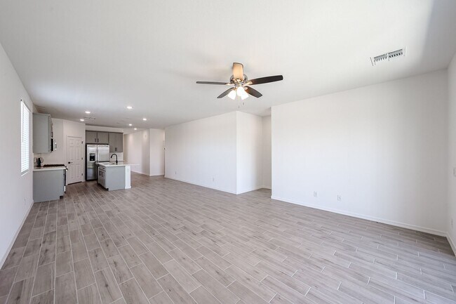 Building Photo - Modern Mountainside Living: Stunning New 4-Bedroom Home in Estrella Crossing! 3 CAR GARAGE!