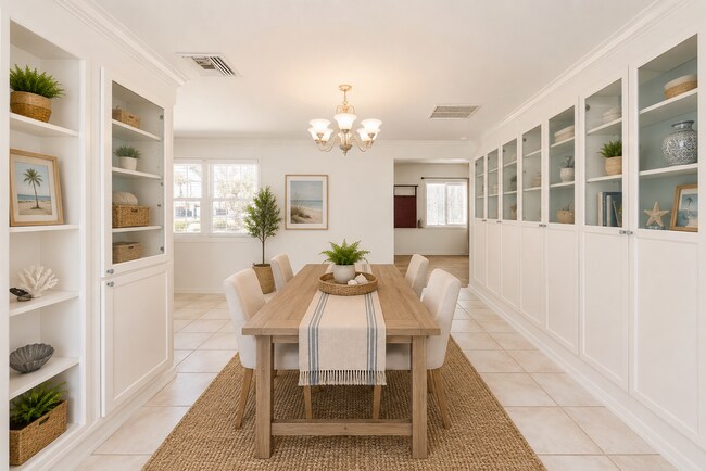 Building Photo - Live the ultimate Space Coast waterfront lifestyle at this stunning beachside canal home in Satel...