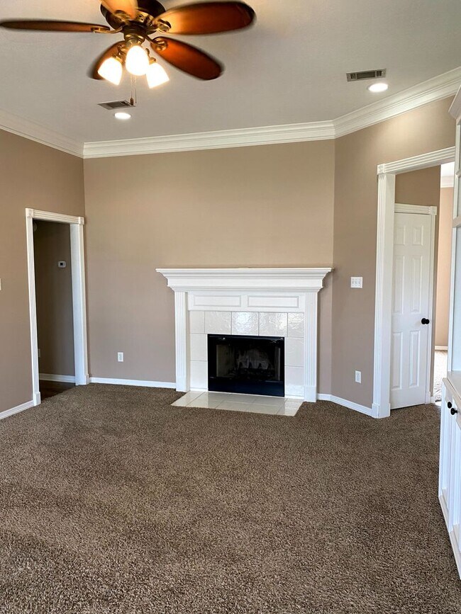 Building Photo - FABULOUS THREE BEDROOM HOME WITH LARGE DECK, FIREPLACE AND FLEX ROOM