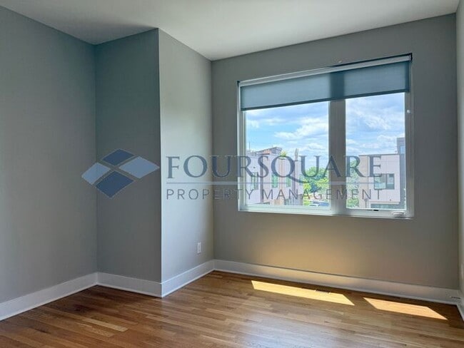 Building Photo - Beautiful  3-Bed / 3.5-Bath End-Unit Townhome with Rooftop Patio, Skyline Views & Climate-Control...