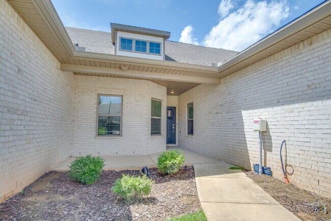 Building Photo - Spacious Cantonment Townhome with Open Layout, 2-Car Garage, Covered Back Porch & Easy Access to ...