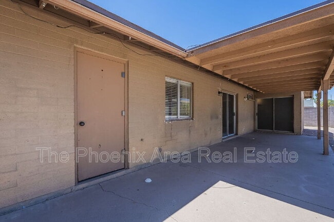 Building Photo - 1556 W Peralta Ave