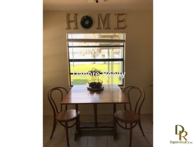 Building Photo - Lakefront-Remodeled 2 Bed, Garage, Wood Fl...