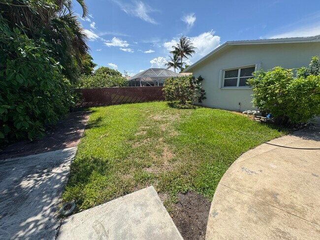 Building Photo - 4130 NW 9th Ct