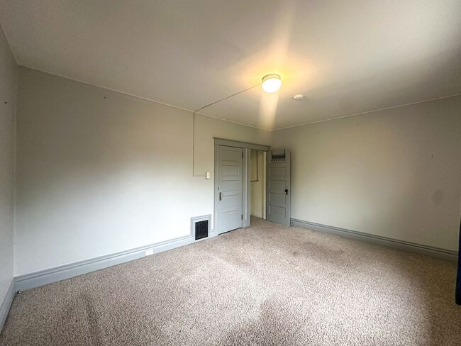 Building Photo - A home where old-world charm meets modern sophistication!
