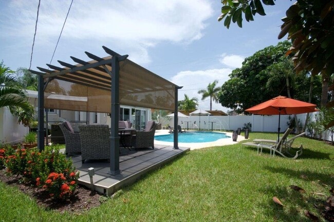 Building Photo - Step Into Sunshine: Modern Charm Meets Coa...