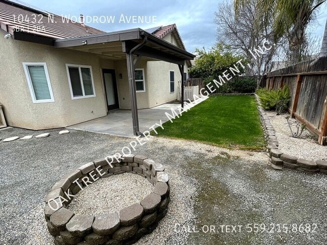 Building Photo - 10432 N Woodrow Ave