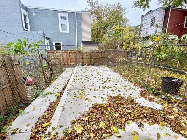 Building Photo - Three-Bedroom Home with a Private Back Patio