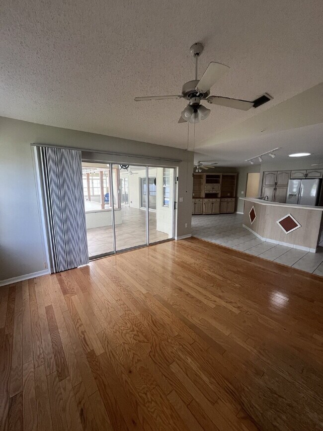 Building Photo - Spacious Pool Home in Desirable Palm Harbor – Pool Care Included