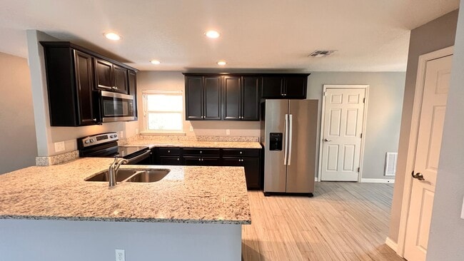 Building Photo - BEAUTIFUL 3/2 w/ office HOME in Deltona!