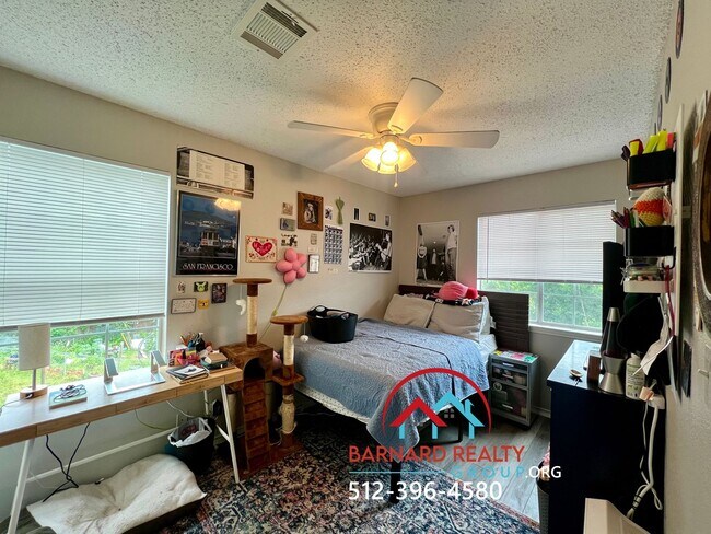 Building Photo - Available July 18: 3 bedroom, 2.5 Bath Duplex with Garage and Fenced Yard