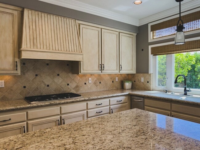 Building Photo - Elegant Mediterranean Living with Private Pergola Garden & Resort Amenities