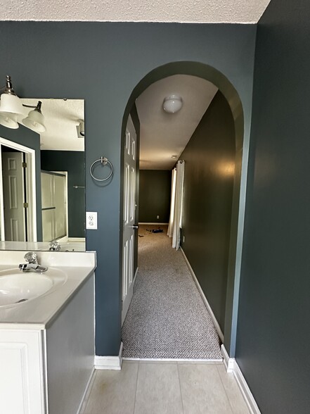 Hallway in Primary from bath to bed with closet - 2595 Thackery Rd