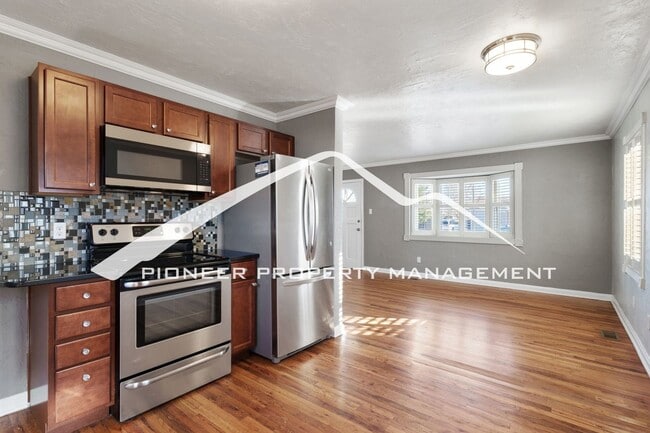 Building Photo - Downtown Charm with Private Yard, Oversized Garage and AC