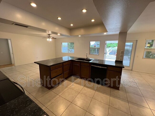 Building Photo - 9719 W Wrangler Dr
