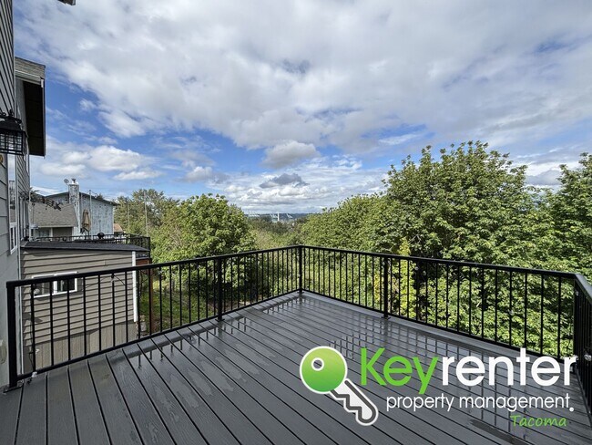 Building Photo - Stylish 4-Bedroom Home with Finished Basem...