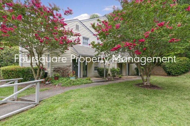 Building Photo - Charming 1st-Floor End-Unit Condo with Gas Log Fireplace, Private Back Porch & Community Pool – T...