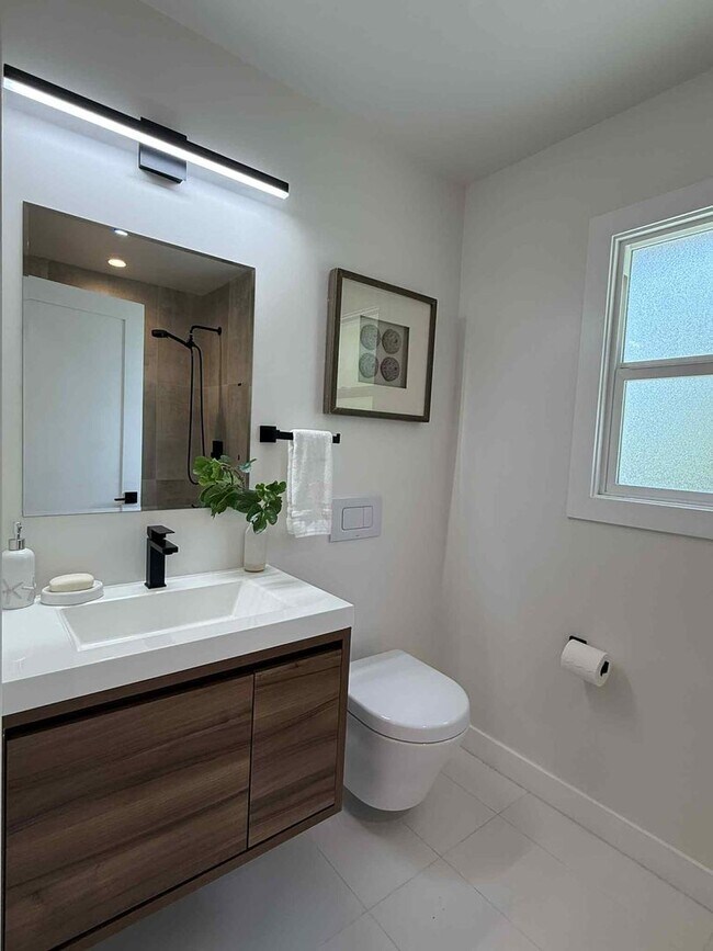 Building Photo - Modern 4-Bedroom Retreat in San Carlos – Remodeled, Spacious, Private Yard