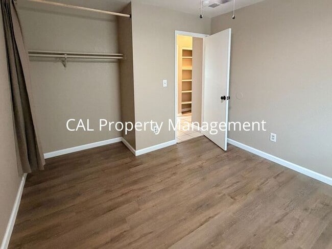 Building Photo - Spacious 4-Bedroom Home with 2-Car Garage & Backyard Oasis