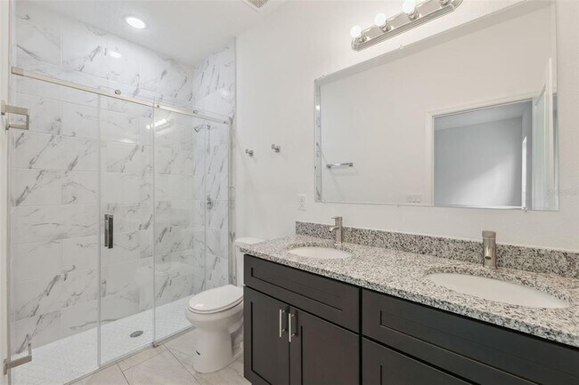 Building Photo - 10089 N Athenia Dr