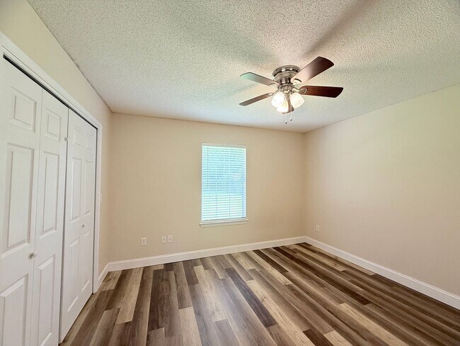 Building Photo - Beautiful 3/2 With Flex Room - Pace