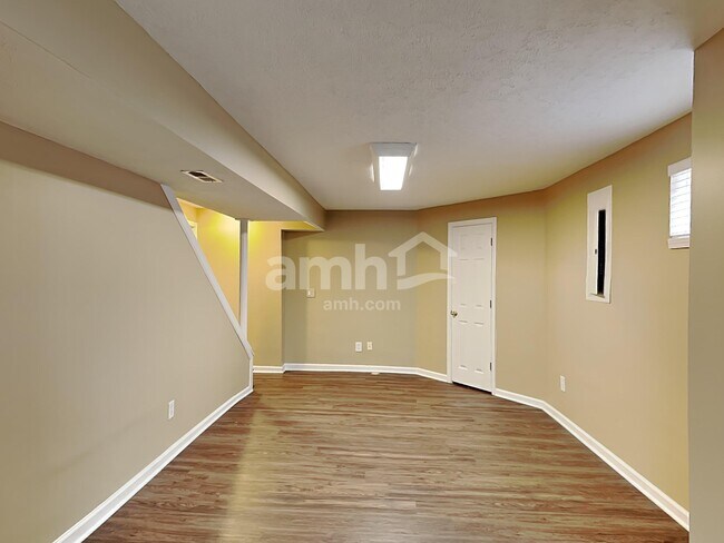 Building Photo - 6312 Satin Wood Dr