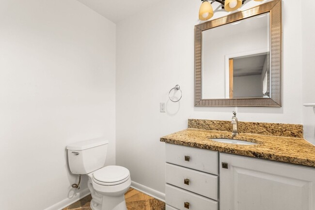 Building Photo - Updated 3BR/2BA Brick Home with Hardwood Floors & Large Yard