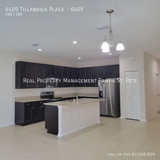 Building Photo - 6409 Tillandsia Pl
