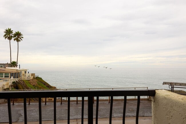 Building Photo - Oceanfront 2 bedroom condo available, full...