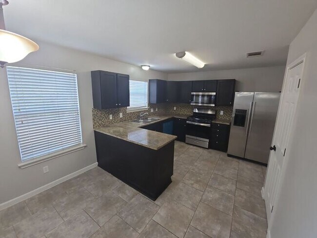 Building Photo - Cozy 3BR Home with Attached 2-Car Garage!!