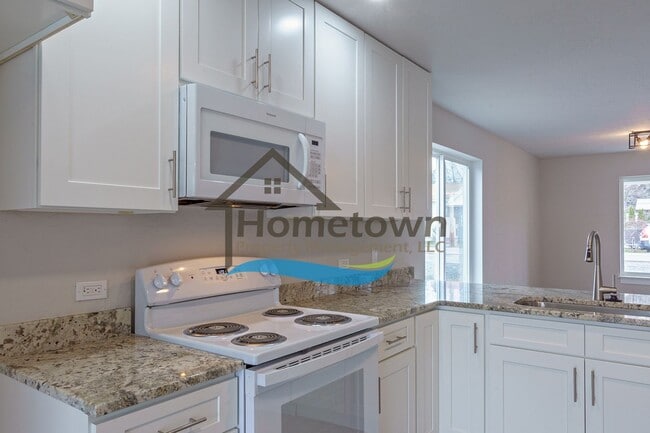 Building Photo - 3 Bedroom Home with 1.5 Bathrooms and an A...