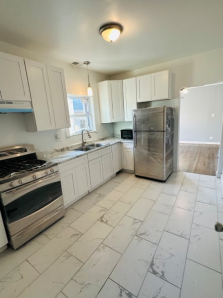 Building Photo - 8841 S Muskegon Ave