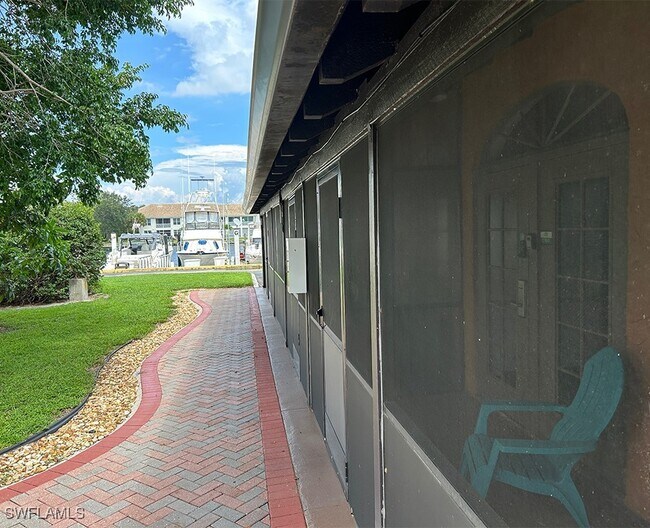 Building Photo - 25000 Tamiami Trl E