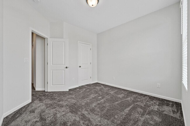 Building Photo - BRAND NEW Townhome located in Westside Ben...