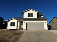 Building Photo - 4 BED | 3 BATH | TRI-LEVEL | DOUBLE GARAGE...