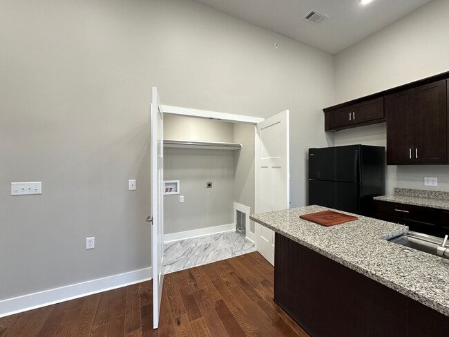 Building Photo - Charming Downtown Apartments