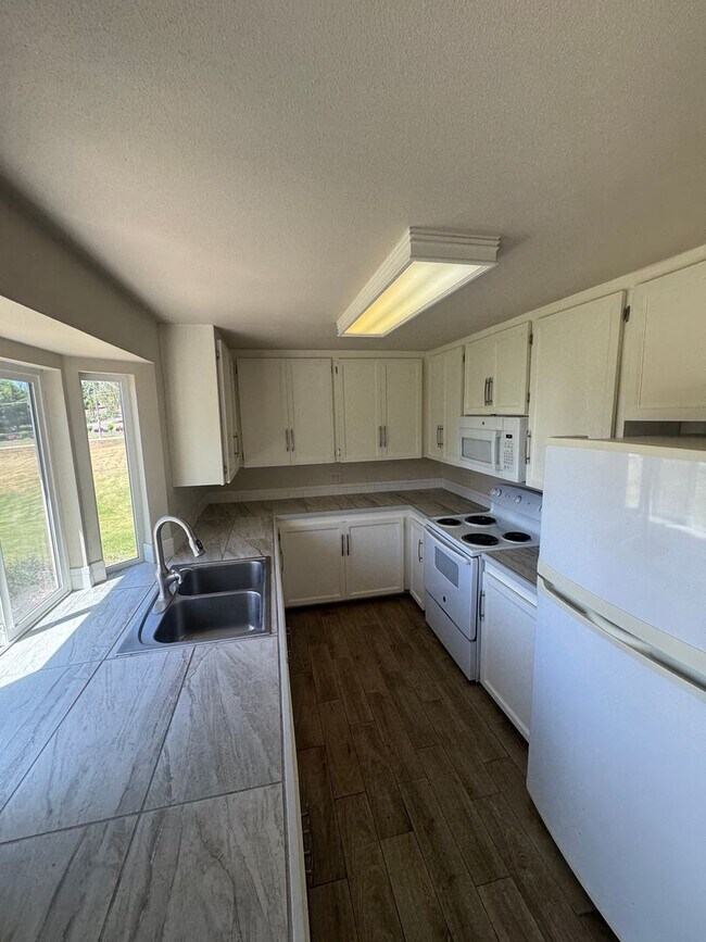 Building Photo - Non-Refundable & Security Deposit Total: $...